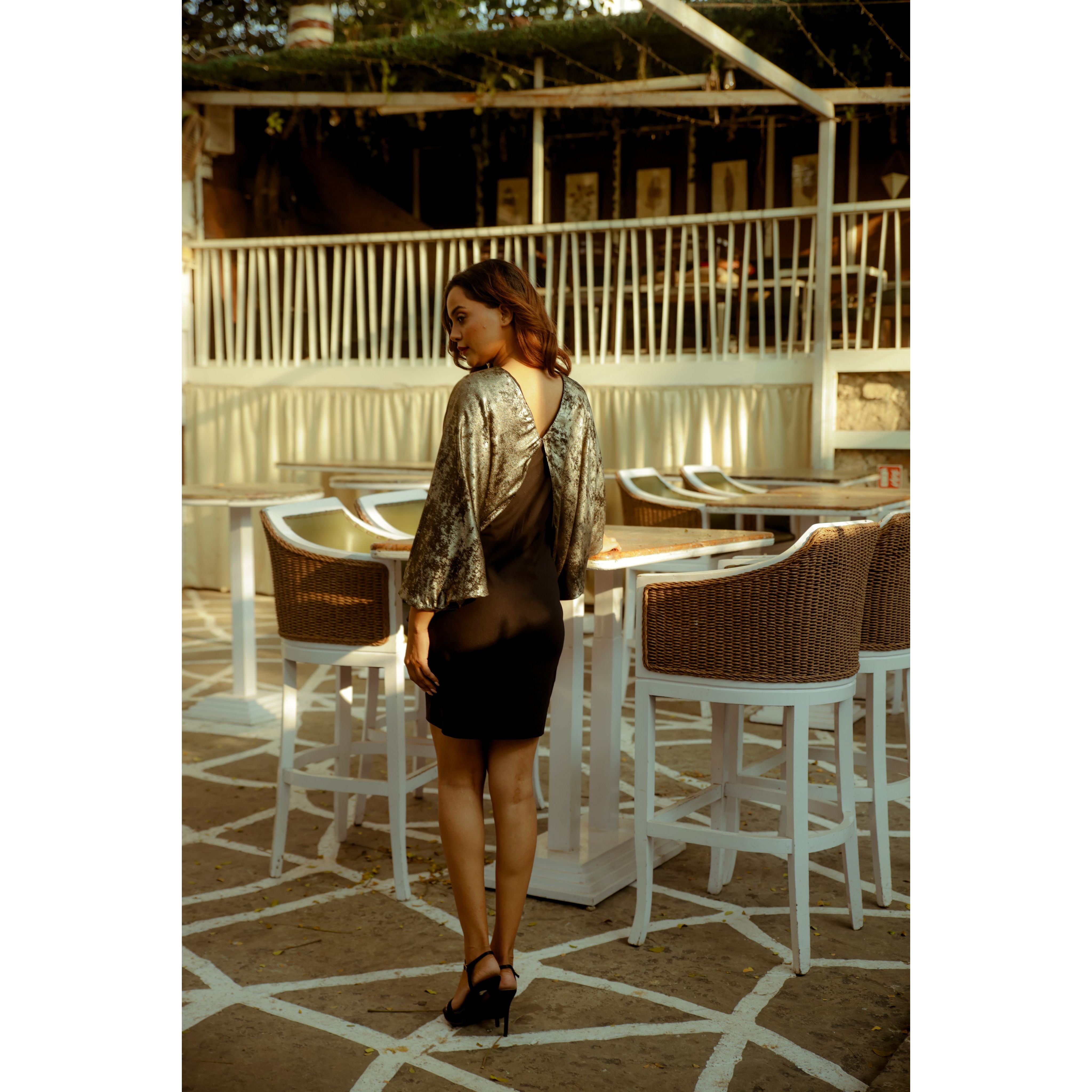 Dress with cape feature